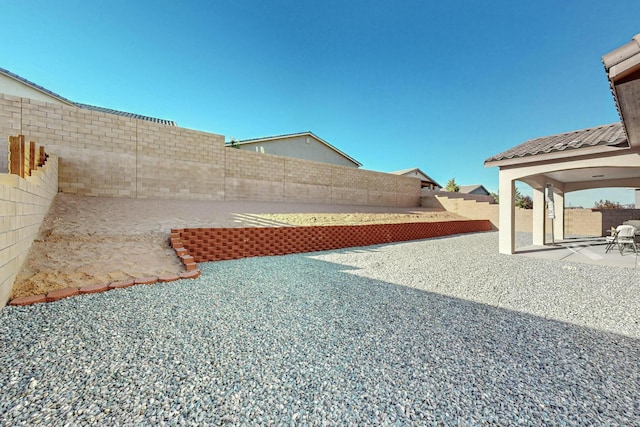 4017 Windy Rd NE, Rio Rancho, NM 87144 - view of yard featuring a fenced backyard and a patio area