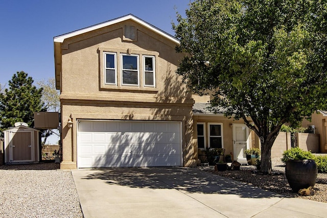 traditional-style home featuring driveway, a shed, an outbuilding, stucco siding, and a garage