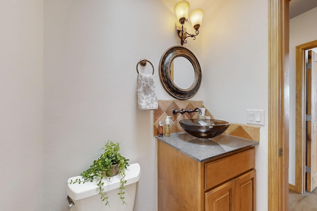 630 Barnett Rd, Bosque Farms, NM 87068 - bathroom featuring vanity and toilet
