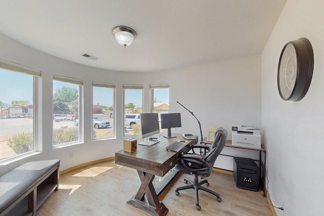 630 Barnett Rd, Bosque Farms, NM 87068 - office featuring plenty of natural light, wood finished floors, and baseboards