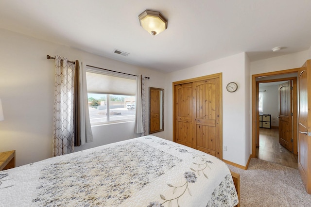 630 Barnett Rd, Bosque Farms, NM 87068 - bedroom with carpet floors, a closet, and baseboards
