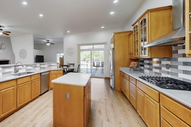 630 Barnett Rd, Bosque Farms, NM 87068 - kitchen with a sink, appliances with stainless steel finishes, wall chimney range hood, ceiling fan, and recessed lighting
