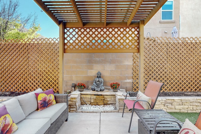 view of patio featuring a pergola, fence, and an outdoor hangout area