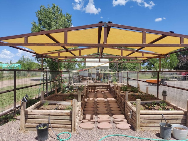 7 Wildwood Ln, Peralta, NM 87042 - view of property's community featuring fence and a vegetable garden