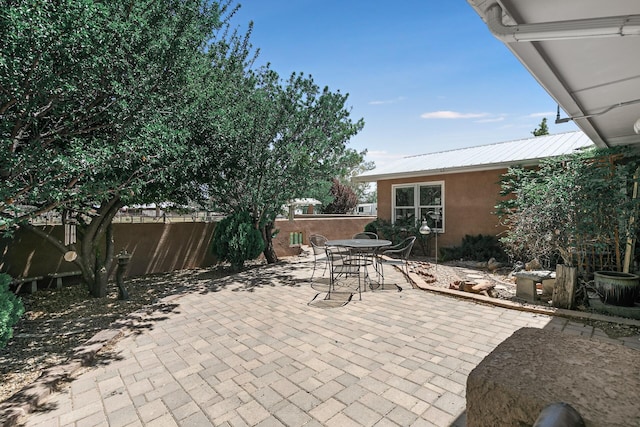 7 Wildwood Ln, Peralta, NM 87042 - view of patio featuring fence and outdoor dining space