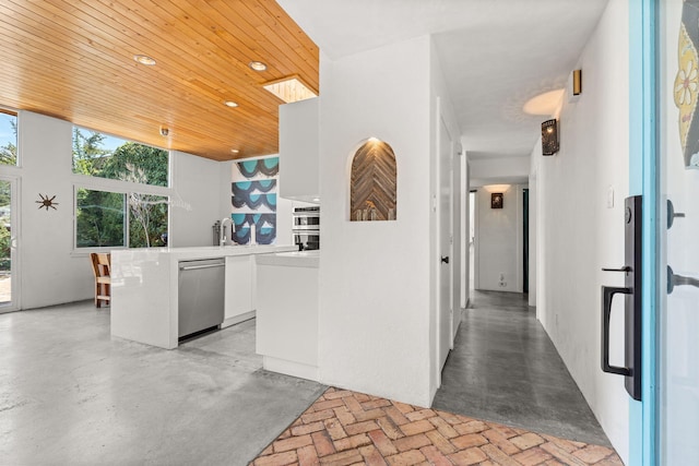 corridor with recessed lighting and wood ceiling