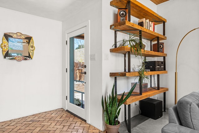 interior space with brick floor