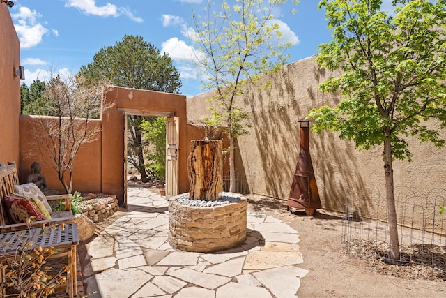 view of patio featuring fence