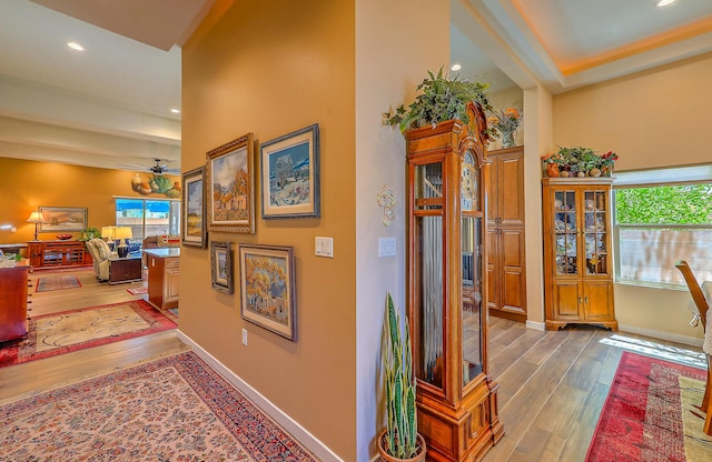 3919 Bryan Ave NW, Albuquerque, NM 87114 - hallway with wood finished floors, healthy amount of natural light, recessed lighting, and baseboards