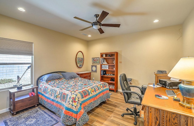3919 Bryan Ave NW, Albuquerque, NM 87114 - bedroom featuring wood finished floors, recessed lighting, a desk, a ceiling fan, and baseboards