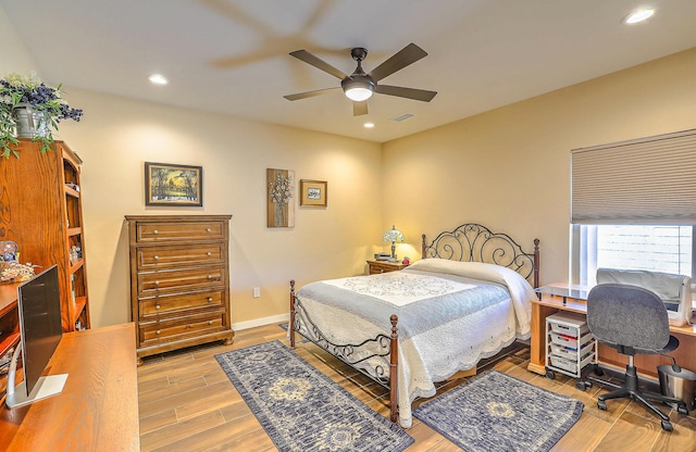 3919 Bryan Ave NW, Albuquerque, NM 87114 - bedroom featuring wood finished floors, recessed lighting, and ceiling fan