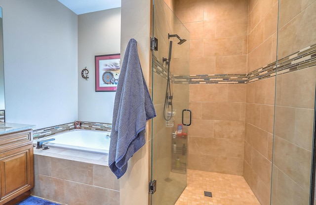 3919 Bryan Ave NW, Albuquerque, NM 87114 - full bath featuring a stall shower, a garden tub, and vanity
