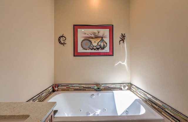 3919 Bryan Ave NW, Albuquerque, NM 87114 - full bathroom featuring a tub with jets and vanity