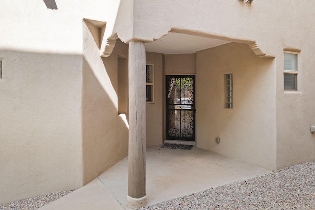 8719 Desert Fox Way NE, Albuquerque, NM 87122 - entrance to property with stucco siding