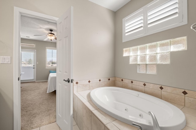 8719 Desert Fox Way NE, Albuquerque, NM 87122 - bathroom with a jetted tub, a ceiling fan, and ensuite bath