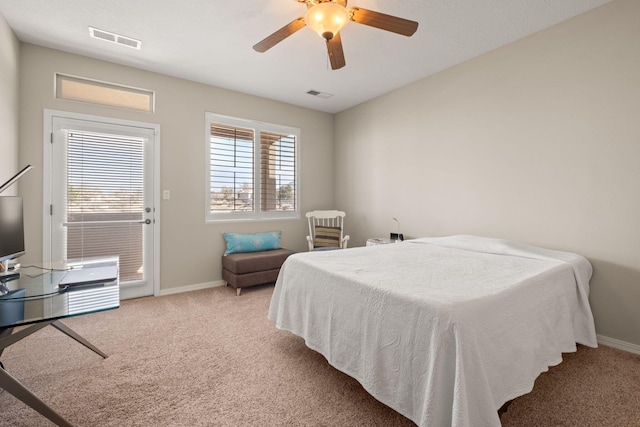 8719 Desert Fox Way NE, Albuquerque, NM 87122 - carpeted bedroom with a ceiling fan, baseboards, and visible vents