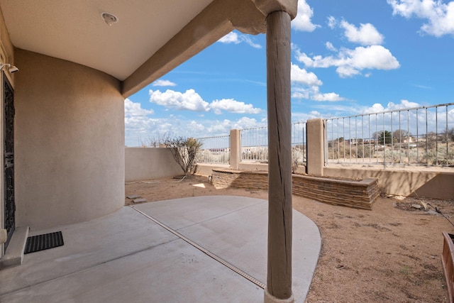 8719 Desert Fox Way NE, Albuquerque, NM 87122 - view of patio with a fenced backyard