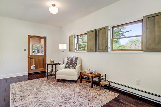 107 Rome Ln, Corrales, NM 87048 - living area featuring dark wood-type flooring and baseboard heating