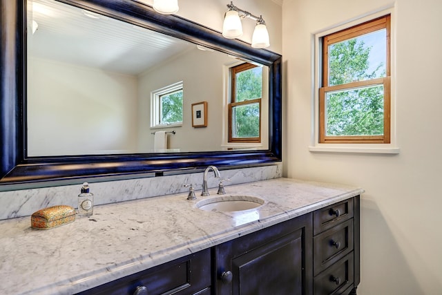 107 Rome Ln, Corrales, NM 87048 - bathroom with vanity and crown molding