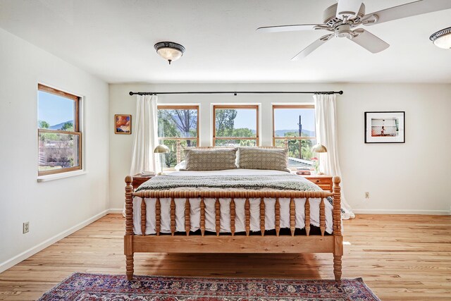 107 Rome Ln, Corrales, NM 87048 - bedroom with light wood finished floors