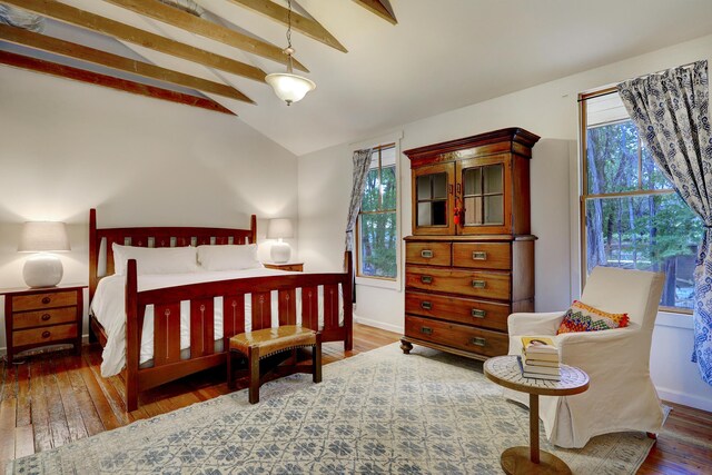 107 Rome Ln, Corrales, NM 87048 - bedroom featuring multiple windows and hardwood / wood-style floors