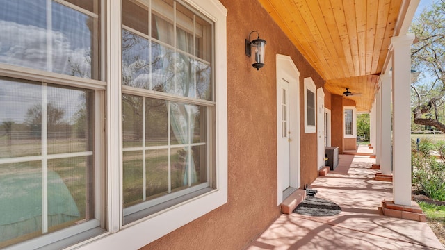 535 Cacahuate SW, Albuquerque, NM 87105 - view of side of property with stucco siding and a porch