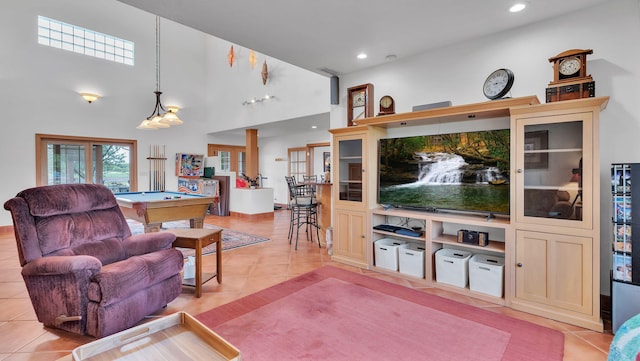 535 Cacahuate SW, Albuquerque, NM 87105 - living area with pool table, light tile patterned floors, recessed lighting, and a towering ceiling