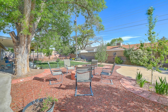 view of yard with a patio area and fence