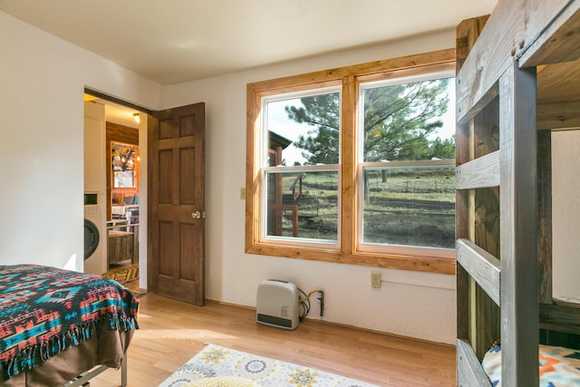 bedroom with light wood-type flooring