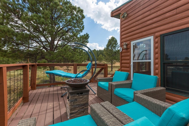 wooden deck with outdoor lounge area