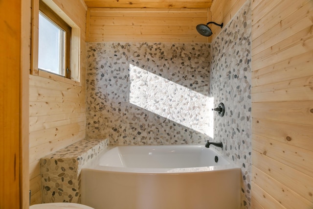 full bathroom featuring wood walls