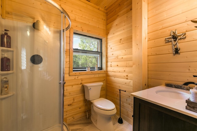full bath with vanity, toilet, wood walls, and a stall shower