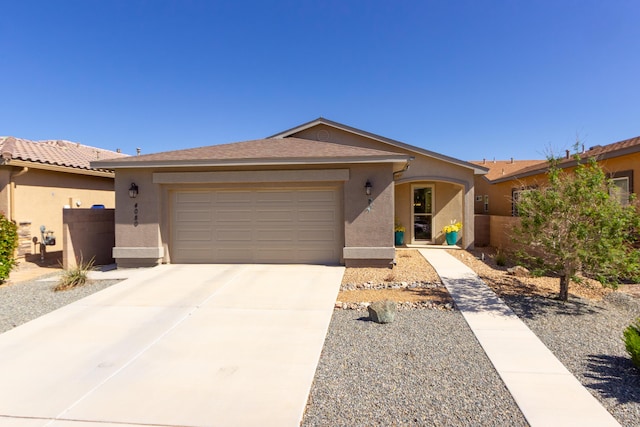 ranch-style home with concrete driveway, a garage, fence, and stucco siding