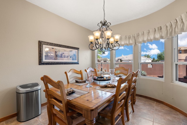 3809 Bay Hill Loop SE, Rio Rancho, NM 87124 - dining space featuring baseboards, a notable chandelier, and light tile patterned floors