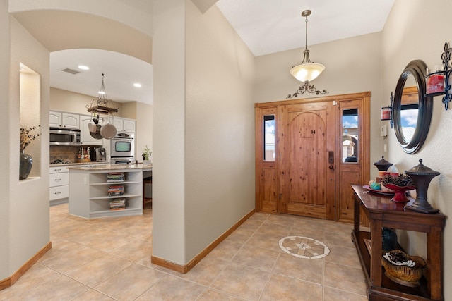 3809 Bay Hill Loop SE, Rio Rancho, NM 87124 - entryway with light tile patterned floors and baseboards