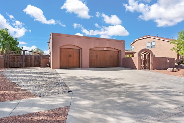 3809 Bay Hill Loop SE, Rio Rancho, NM 87124 - exterior space with fence, a gate, and driveway