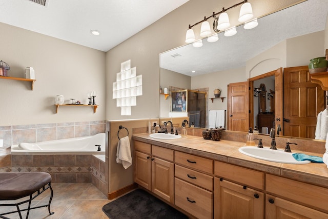 3809 Bay Hill Loop SE, Rio Rancho, NM 87124 - full bath featuring tile patterned flooring, a sink, a bath, and a stall shower