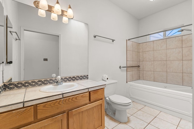 bathroom featuring vanity, tile patterned floors, toilet, and shower / tub combination
