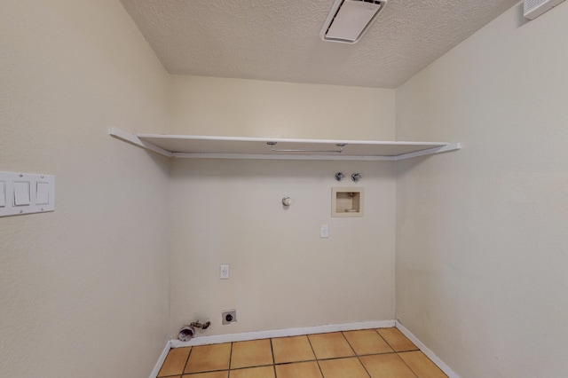 washroom featuring laundry area, hookup for a washing machine, baseboards, hookup for a gas dryer, and electric dryer hookup
