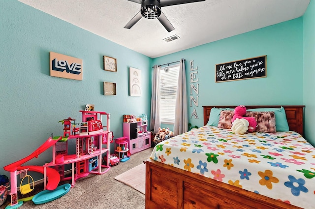 4954 Dream Dancer Dr NE, Rio Rancho, NM 87144 - carpeted bedroom featuring a ceiling fan and visible vents