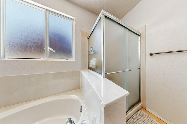 4954 Dream Dancer Dr NE, Rio Rancho, NM 87144 - full bathroom featuring a garden tub and a stall shower