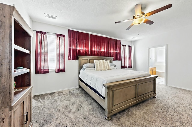 4954 Dream Dancer Dr NE, Rio Rancho, NM 87144 - bedroom featuring light colored carpet, baseboards, ceiling fan, and ensuite bath