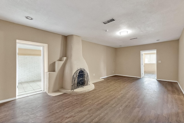 7121 Isleta Blvd SW Rear, Rear, Albuquerque, NM 87105 - unfurnished living room with wood finished floors and baseboards