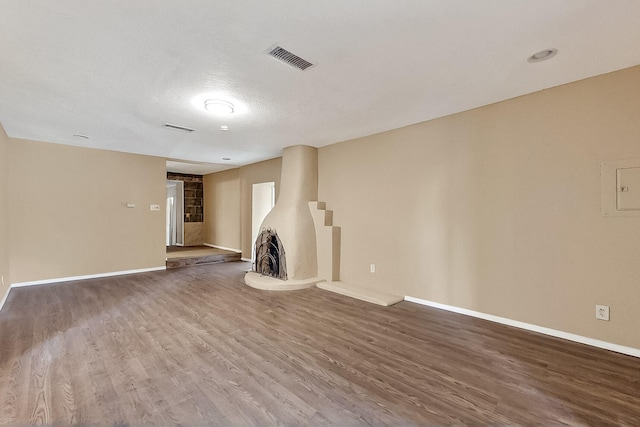 7121 Isleta Blvd SW Rear, Rear, Albuquerque, NM 87105 - unfurnished living room with wood finished floors and baseboards