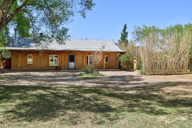 545 Atrisco Dr NW, Albuquerque, NM 87105 - view of front of property featuring metal roof