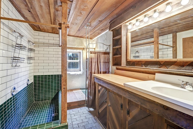 545 Atrisco Dr NW, Albuquerque, NM 87105 - bathroom featuring vanity, brick floor, a stall shower, and wooden ceiling