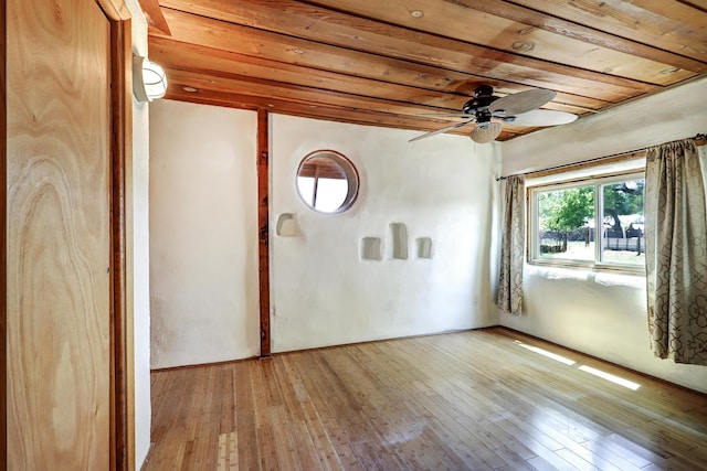 545 Atrisco Dr NW, Albuquerque, NM 87105 - empty room with wood ceiling, a ceiling fan, and hardwood / wood-style floors