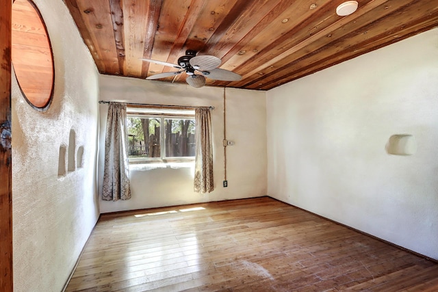 545 Atrisco Dr NW, Albuquerque, NM 87105 - empty room featuring ceiling fan, wood ceiling, and hardwood / wood-style floors