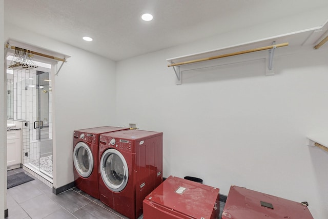 7218 Whippoorwill Ln NE, Albuquerque, NM 87109 - washroom featuring tile patterned flooring, recessed lighting, and washing machine and clothes dryer