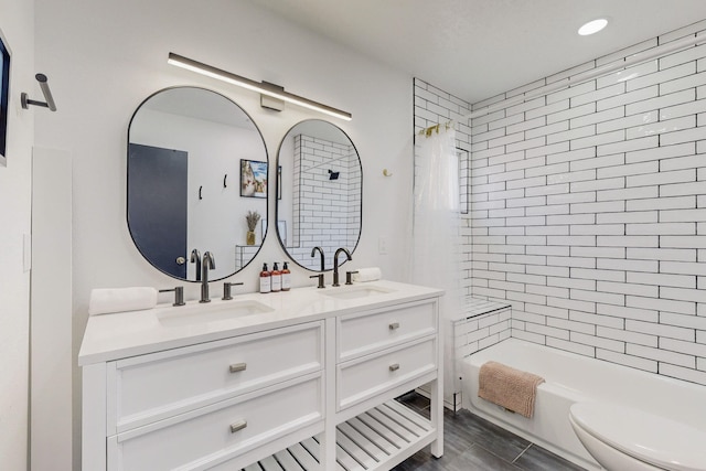7218 Whippoorwill Ln NE, Albuquerque, NM 87109 - bathroom with a sink, shower / bath combo, toilet, and double vanity
